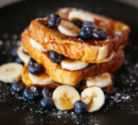 French toast with bananas and blueberries.